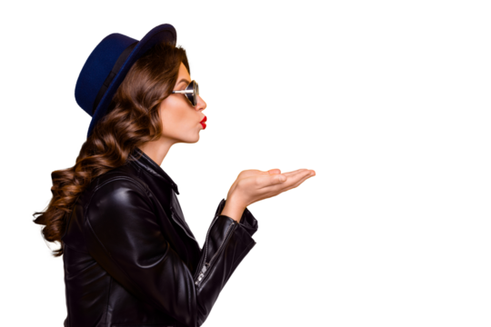 Profile side photo of dream dreamy girl send air kises to her boyfriends on 14-february date wear modern black leather jacket isolated over yellow color background