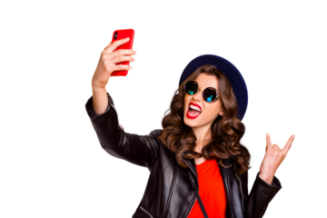 Heavy metal blogger! Party influencer! Portrait of funny comic girl make selfie show two fingers horned sign enjoy heavy metal concert wear cap black, outfit isolated over yellow color background