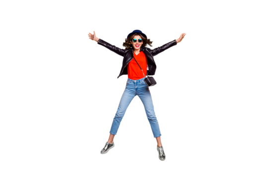 Full size photo of cheerful funny hipster jump enjoy weekends journey wear denim jeans clothes good look isolated over yellow color background