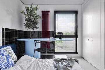 A modern bedroom integrates a stylish workspace and decorative plant for a serene atmosphere