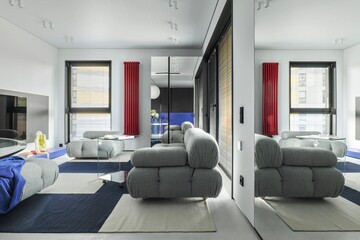 Explore the sophistication of modern living room design infused with a minimalist aesthetic