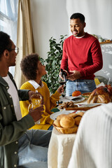 Friends share a heartfelt Thanksgiving celebration filled with laughter, food, and joy.
