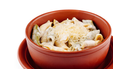 Pasta dish with white sauce and grated cheese in a brown bowl