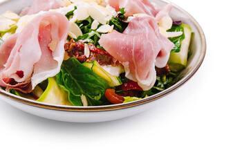 Fresh italian salad with prosciutto and parmesan