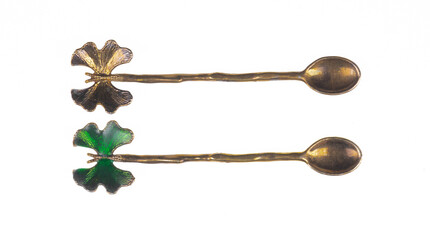 vintage bronze dessert spoons isolated on white background