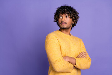Photo of confident handsome man wear yellow clothes crossed arms look empty space isolated on...