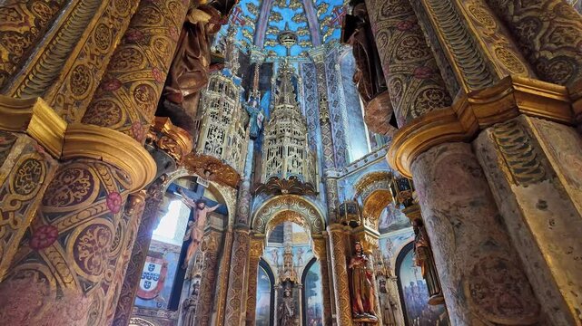 Interior view at the Charola of the Convent of Christ, magnificent Knights Templar architecture, round church altar, paintings and very peculiar ornaments, Tomar Portugal