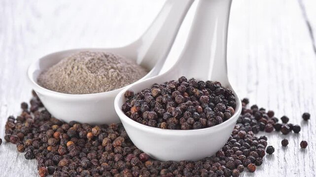 black peppercorn on white background