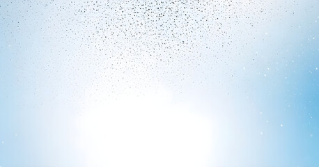 Obraz premium Silver confetti exploding on light blue and white background