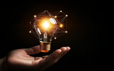 Bright light bulb in hand with abstract digital connections, innovation and creative ideas represented with technological data overlay