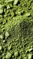 Obraz premium pile of loose green powder of matcha, closeup macro shot. health, wellness, natural ingredients, traditional Japanese tea culture. poster or background