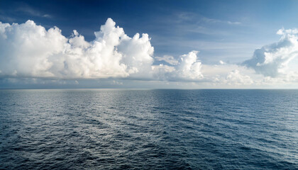 Obraz premium Calm weather on sea or ocean with clouds