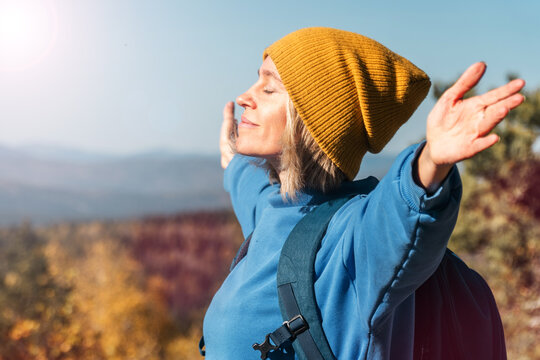 Female with Backpack on Hike in nature