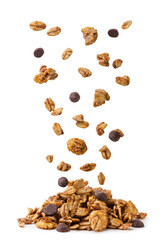 Chocolate granola falling on a pile on a white background. Isolated