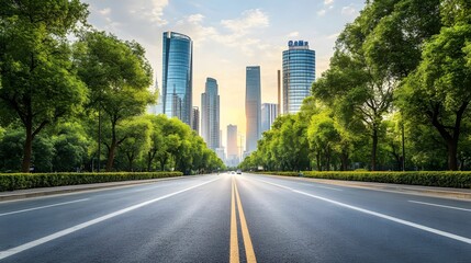 A wide, empty road lined with trees leads towards tall glass skyscrapers in a modern city, blending urban architecture with nature.