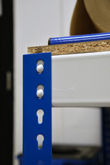 Metal legs for a self-assembly workbench.