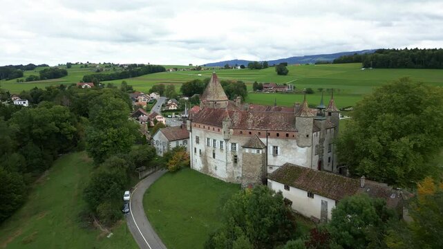 Push in drone shot of wonderful Oron Castle in Vaud Switzerland