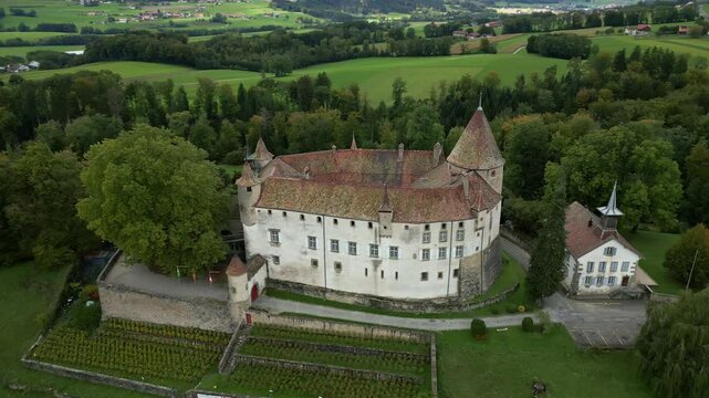 Orbit drone shot close to nice Oron Castle in Vaud Switzerland