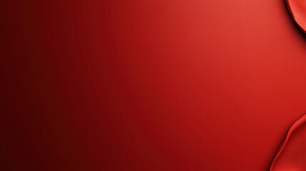 Obraz premium Minimalistic red background with a right corner showcasing a subtly folded fabric texture, creating a smooth gradient effect.