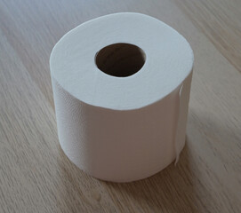 Beautiful close-up of a full roll of toilet paper