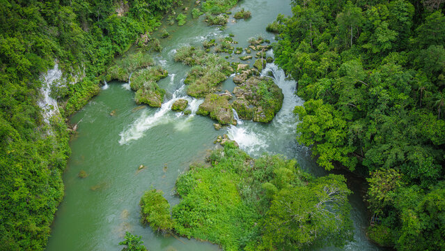 A view of the Loboc River running through the rainforest (green jungle). Bohol, Philippines.