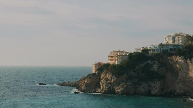 Large luxury house on the Mediterranean coast. Mansion on the top of a cliff by the sea. Paradise on Earth in Santa Ponsa, Palma, Spain.