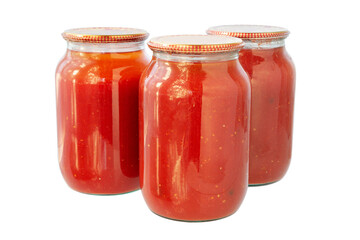 Jars of tomato juice. Canned tomato Juice prepared at home in glass, cut out