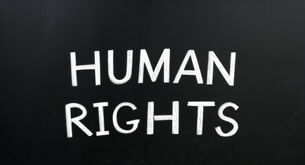 human rights text lettering on blackboard chalkboard background