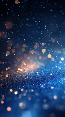 Fototapeta premium A mesmerizing display of shimmering blue and gold bokeh lights.