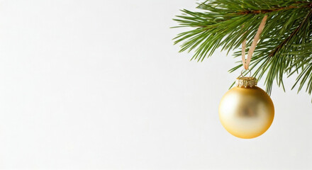 Minimalist golden Christmas ornament hanging pine branch