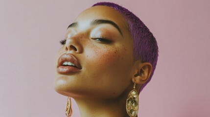Close-up of a woman with purple buzzcut, wearing statement earrings, playful facial expression, in a minimalist studio setting with soft lighting