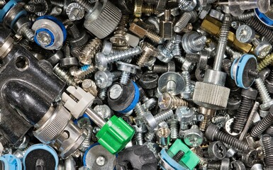 Computer fasteners hardware assorted odds and ends technology background.