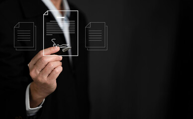 E-document management Paperless workplace, Businessman  writing on document for online approve paperless quality assurance and ERP management,online documentation database, paperless office concept.