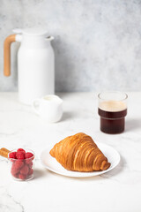 freshly baked golden French croissant