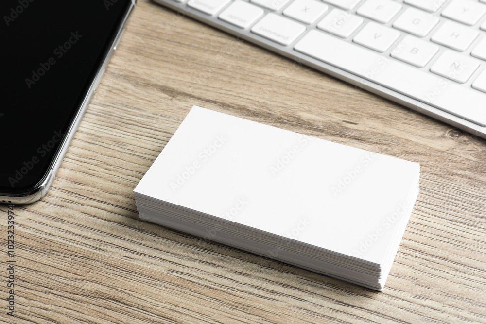 Poster Blank business cards and keyboard on wooden table. Mockup for design