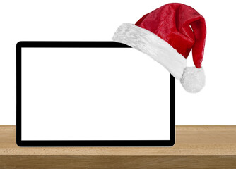 a tablet computer isolated with a Santa Claus hat for Christmas on the white backgrounds