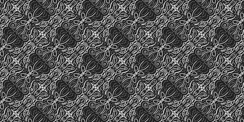 A traditional black and white batik texture showcasing a detailed, flowing floral pattern with swirling lines and dots, adding a classic, elegant touch to the design.