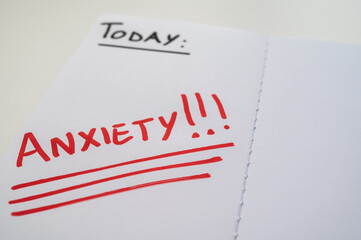 Blank journal page, with the word Anxiety in red. Anxiety and a request for help.