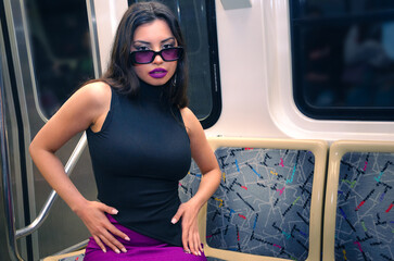 Fashion Girl With Glasses On A Subway