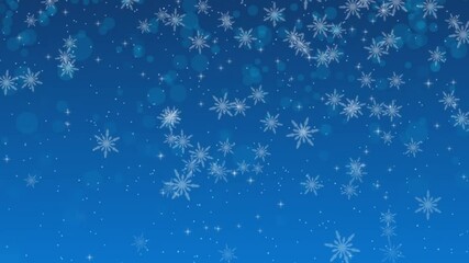 Blue Christmas background with glittering white particles and snow flakes.