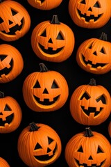 A collection of carved Halloween pumpkins with various cheerful faces, ideal for autumn decorations and seasonal festivities.