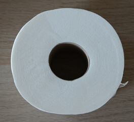 Beautiful close-up of a full roll of toilet paper