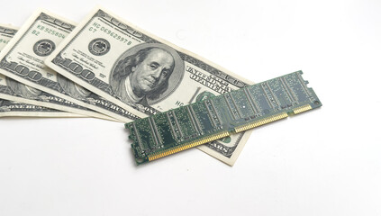 Computer CPU and memory chips on US dollar banknotes background. The high cost of microelectronics concept