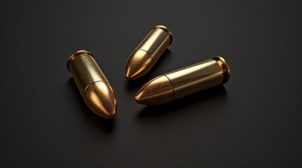 Three gold bullets arranged neatly in a straight row