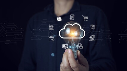 businessman is holding a shining lightbulb that features learning icons for concepts in critical thinking, study skills, and problem-solving.