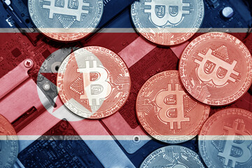 flag of north korea on the bitcoins with computer electronic circuit board background. bitcoin...