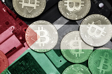flag of palestine on the bitcoins with computer electronic circuit board background. bitcoin...