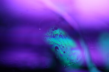 B fantastic reflection of the liquid in macro, colors, surrealistic background, fantastic smooth...