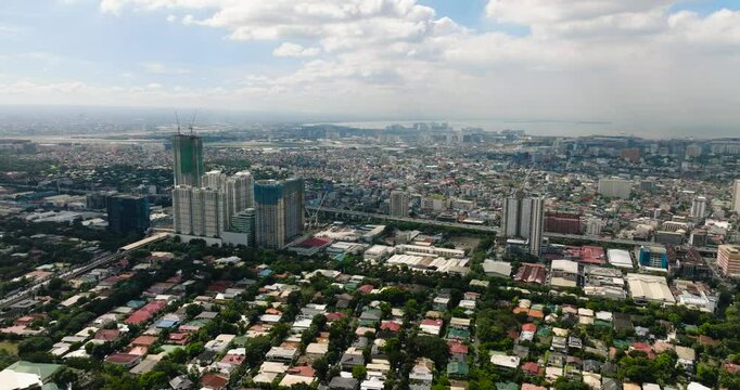 Coastal City with residential area and buildings Manila Cityscape. Philippines.