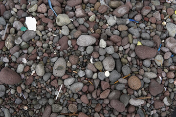 Pebble Beach Texture with Plastic Pollution